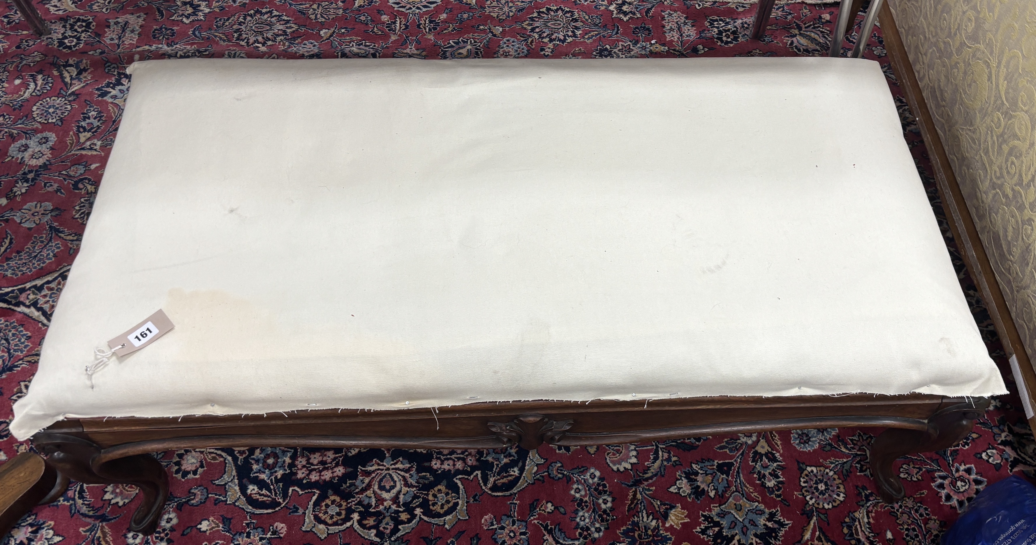 A large Victorian rectangular rosewood stool with upholstered drop in seat, width 124cm, depth 65cm, height 44cm